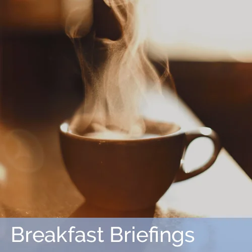 hot cup of coffee with steam rising off the top; breakfast briefings text written at bottom